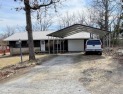 3 bedroom 2 bath home on a level lot.  It's minutes to shopping for sale in Horseshoe Bend Arkansas Izard County County on GolfHomes.com