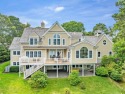 Experience the best of coastal living at this elegant retreat for sale in Mashpee Massachusetts Barnstable County County on GolfHomes.com