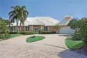Lovely lakefront home situated in Waterford, an exclusive for sale in Naples Florida Collier County County on GolfHomes.com