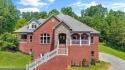 Impressive 5-bedroom, 5-bath home nestled on 1.68 private acres for sale in Oak Ridge Tennessee Anderson County County on GolfHomes.com
