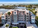 Discover luxury waterfront living in Boca Vista Harbor with this for sale in Placida Florida Charlotte County County on GolfHomes.com