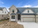 Beautiful prestigious New Construction end unit split level for sale in Rochester Hills Michigan Oakland County County on GolfHomes.com
