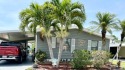 Situated on a spacious corner lot, this home features an for sale in North Fort Myers Fl. Florida Lee County County on GolfHomes.com