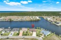 Enjoy SPECTACULAR views of WIDE Quick Silver Lake  3-way for sale in Cape Coral Florida Charlotte County County on GolfHomes.com