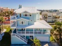 Enjoy the views from this updated, 4 story Beach House. As you for sale in Port Aransas Texas Nueces County County on GolfHomes.com