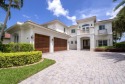 Luxuriously appointed and located in the private gated golf for sale in Jupiter Florida Palm Beach County County on GolfHomes.com