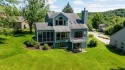 Perched above the fairways with commanding golf and wooded ridge for sale in Galena Illinois Jo Daviess County County on GolfHomes.com