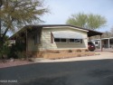 Very nice home on arroyo with fenced yard and mountain views! for sale in Tucson Arizona Pima County County on GolfHomes.com