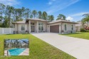 Welcome to 13 Elder Drive, Palm Coast - A Modern Masterpiece in for sale in Palm Coast Florida Flagler County County on GolfHomes.com