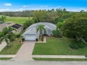 Welcome to your dream home nestled in a serene setting with for sale in Estero Florida Lee County County on GolfHomes.com