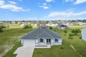 Stunning brand new modern home offering 3 bedrooms plus a for sale in Cape Coral Florida Lee County County on GolfHomes.com