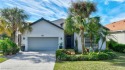 This is an exceptional golf course and saltwater pool home with for sale in Lehigh Acres Florida Lee County County on GolfHomes.com