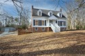 This 3 Level Cape Cod with Dormer Windows with Heart of Pine for sale in Quinton Virginia New Kent County County on GolfHomes.com