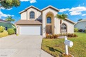 Welcome to this beautifully maintained 3-bedroom, 2.5-bath for sale in Estero Florida Lee County County on GolfHomes.com