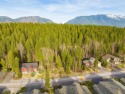 Enjoy the best of both worlds! This lot is nestled amongst the for sale in Columbia Falls Montana Flathead County County on GolfHomes.com