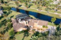 Welcome to this stunning, high-and-dry, custom-built brick home for sale in Daytona Beach Florida Volusia County County on GolfHomes.com