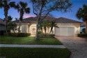 Largest floorplan on the street offers stunning lake views for sale in Naples Florida Collier County County on GolfHomes.com
