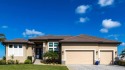 This impeccably designed Waterfront Pool Home in Burnt Store for sale in Punta Gorda Florida Charlotte County County on GolfHomes.com