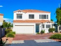 Enjoy the gated serenity of this beautiful home in American West for sale in Las Vegas Nevada Clark County County on GolfHomes.com