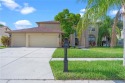 NEW ROOF ~ NEW KITCHEN ~ POND VIEW ~ NO REAR NEIGHBORS ~ HUGE for sale in Riverview Florida Hillsborough County County on GolfHomes.com