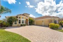 Located in the highly desirable gated community of Levanto, this for sale in Melbourne Florida Brevard County County on GolfHomes.com