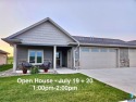 This custom-built 3-bedroom, 2-bath home backs to the 5th hole for sale in Beresford South Dakota Union County County on GolfHomes.com