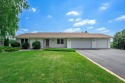 This beautiful ranch home is located on the golf course for sale in Roscoe Illinois Winnebago County County on GolfHomes.com