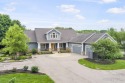 This exquisite custom-built home, nestled on a private 3.4 acre for sale in Ada Michigan Kent County County on GolfHomes.com