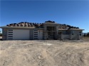Welcome to this brand new, stunning 2,235 sq. ft. home on over for sale in Pahrump Nevada Nye County County on GolfHomes.com