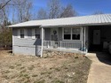 3 bedroom 1.5 bath house with laminate flooring and a walk in for sale in Horseshoe Bend Arkansas Izard County County on GolfHomes.com