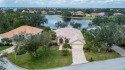 PANORAMIC LAKE VIEWS within the 24/7 secure gated and for sale in Port Charlotte Florida Charlotte County County on GolfHomes.com