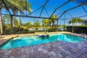 Offering spectacular Country Club living at it's finest in this for sale in Fort Myers Florida Lee County County on GolfHomes.com