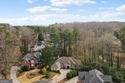 Designed for comfort, privacy, and flexibility, this rare ranch for sale in Acworth Georgia Cobb County County on GolfHomes.com