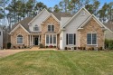 Crafted by one of Virginia's renowned custom builders, this home for sale in New Kent Virginia New Kent County County on GolfHomes.com