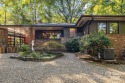 Access this beautifully remodeled Wright-inspired midcentury for sale in Tryon North Carolina Polk County County on GolfHomes.com
