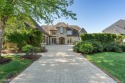 This exquisite French Country-inspired residence is situated for sale in Bloomfield Hills Michigan Oakland County County on GolfHomes.com