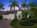 Enjoy breathtaking views overlooking the 5th Tee in this for sale in Estero Florida Lee County County on GolfHomes.com