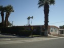 This well-maintained 2-bedroom 2 bath home sits on a long corner for sale in Thousand Palms California Riverside County County on GolfHomes.com