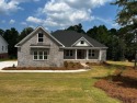 Welcome to your dream home! This stunning 4-bedroom, 2-bathroom for sale in Graniteville South Carolina Aiken County County on GolfHomes.com