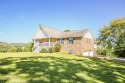 Welcome to 419 Mariner Point Road. This upscale, lakeview home for sale in Lafollette Tennessee Campbell County County on GolfHomes.com