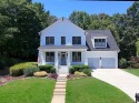 Welcome to this exquisite John Weiland-designed estate, where for sale in Hoschton Georgia Hall County County on GolfHomes.com