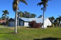 A contemporary home in the Alden Pines Golf Course community for sale in Bokeelia Florida Lee County County on GolfHomes.com