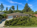 Welcome to this exquisite Mid-Century Modern single-story estate for sale in Granada Hills California Los Angeles County County on GolfHomes.com
