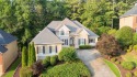Just Listed in Towne Lake Hills East!  Exceptional 5 bedroom 4 for sale in Woodstock Georgia Cherokee County County on GolfHomes.com