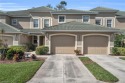Upper level coach home is a short walk to the Clubhouse! for sale in Naples Florida Collier County County on GolfHomes.com