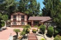Welcome to this exceptionally private five-bedroom home in for sale in Granada Hills California Los Angeles County County on GolfHomes.com