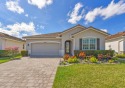 Stunning 3BD/2BA 2021-built home in the gated community of for sale in Jensen Beach Florida Martin County County on GolfHomes.com