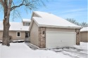 Charming Woodbridge Hills Condo with Golf Course Views! This for sale in Portage Michigan Kalamazoo County County on GolfHomes.com