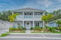 This light and bright two-story OPEN CONCEPT home in Venetian for sale in New Smyrna Beach Florida Volusia County County on GolfHomes.com