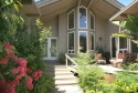 Step into a masterpiece of light and space where a wall of for sale in Aptos California Santa Cruz County County on GolfHomes.com